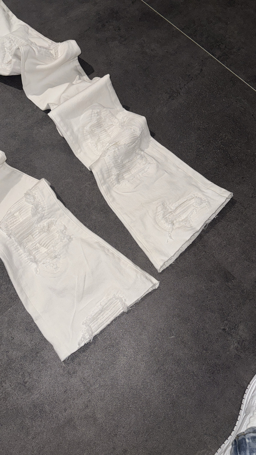 Stacked White Ripped Denim