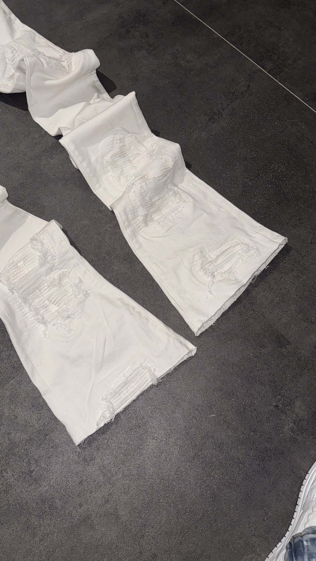 Stacked White Ripped Denim