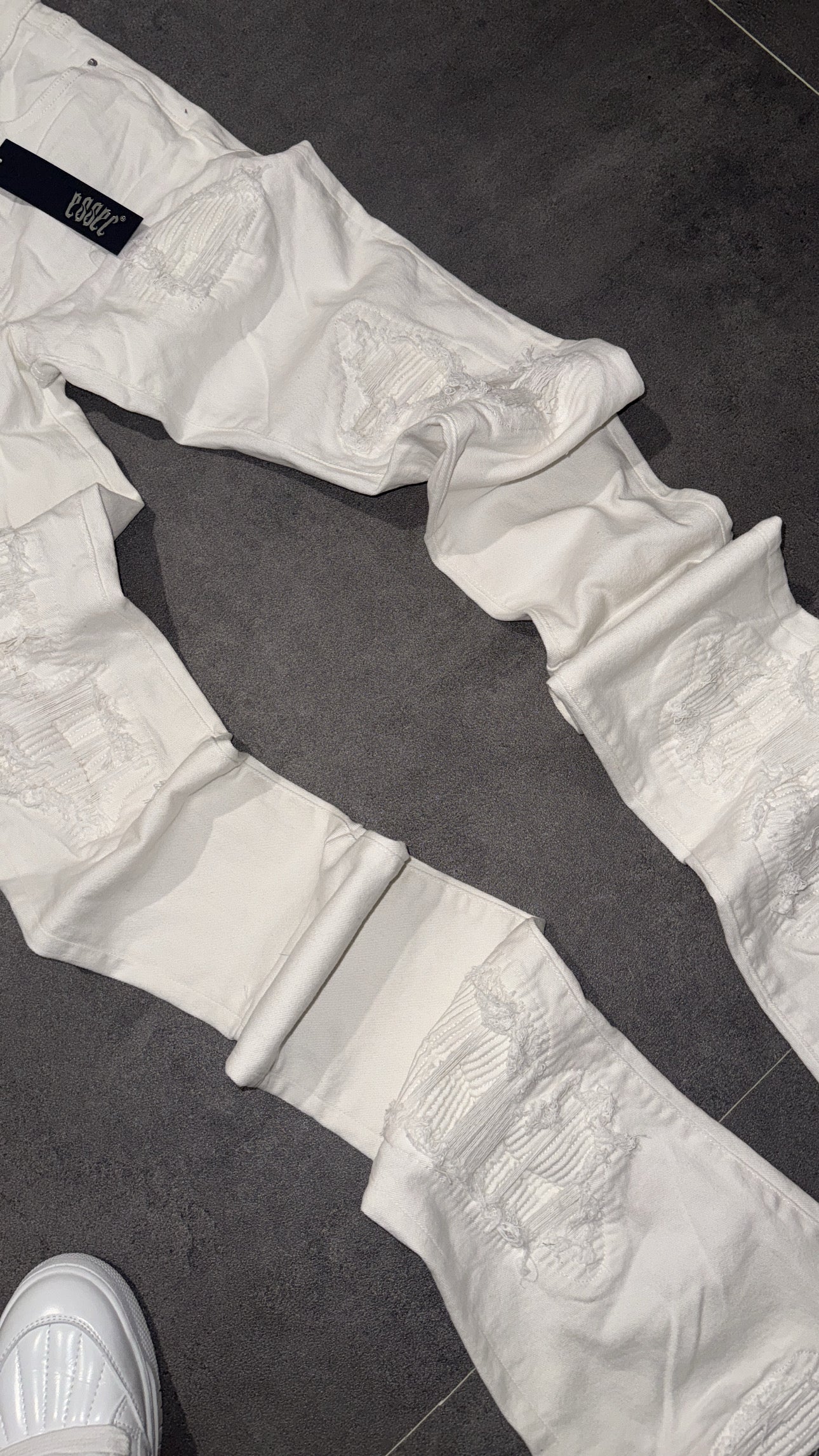 Stacked White Ripped Denim